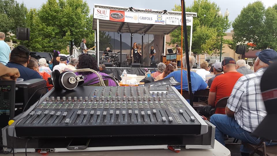 Soundcraft sound board in front of stage