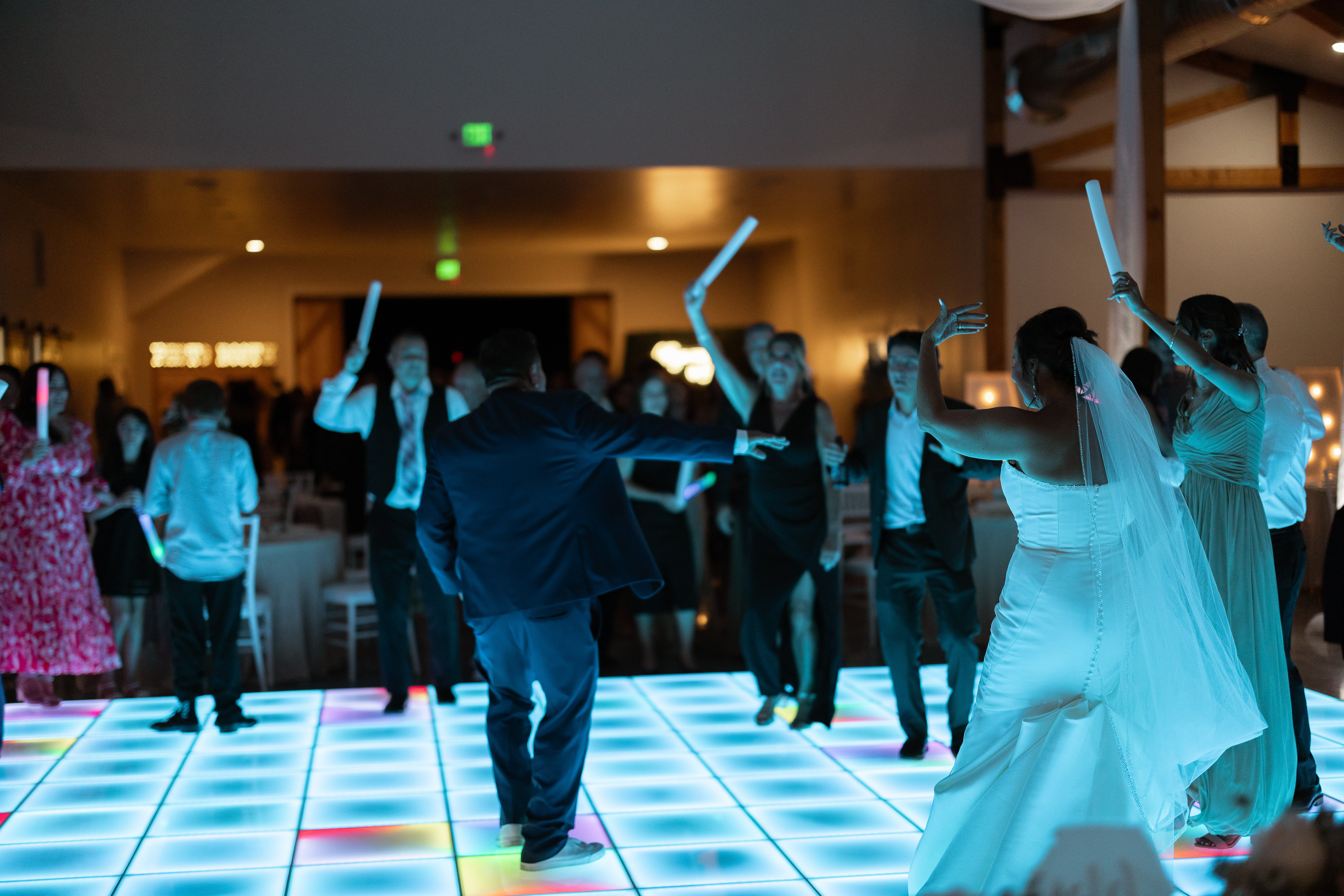 Wedding party dancing on a LED interactive dance floor